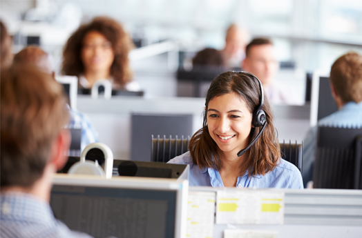 Lady smiling wearing phone headset